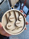 Personalized Our Family Wooden Ornament — Laser Engraved with Family Names & Pet Paw Prints