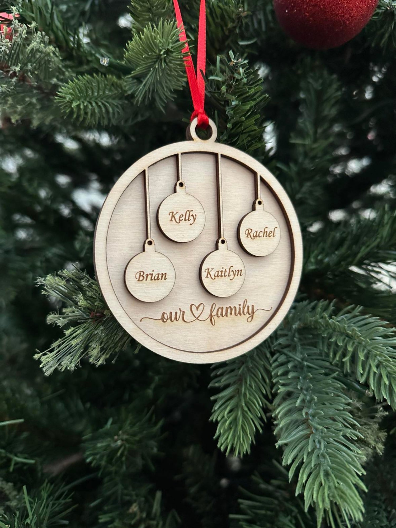 Personalized Our Family Wooden Ornament — Laser Engraved with Family Names & Pet Paw Prints