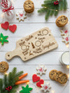 Personalized Christmas cookie platter with cookies, cookies, and a glass of milk on a festive background.